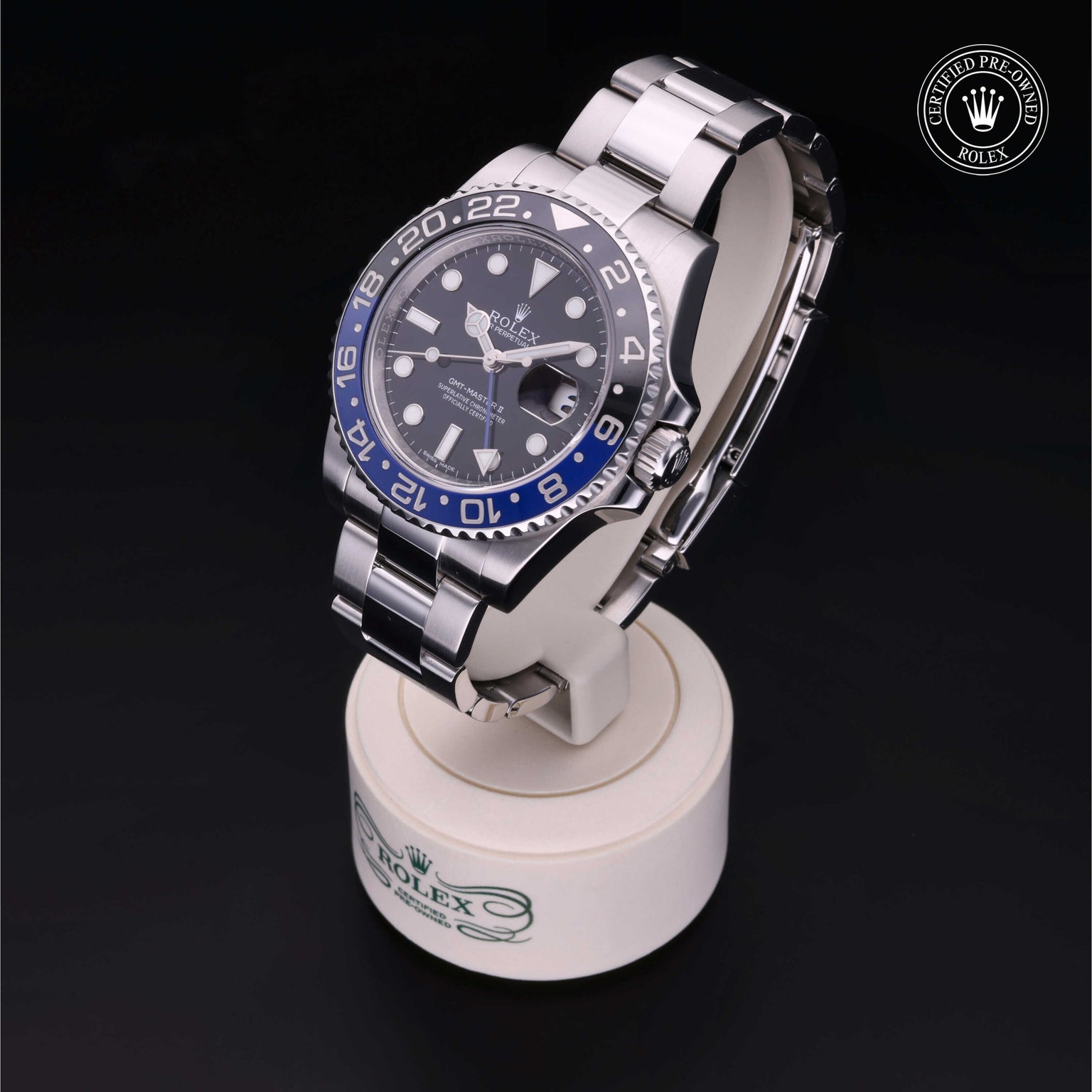 Rolex Certified Pre-owned GMT II M116710BLNR-0002 front on black background