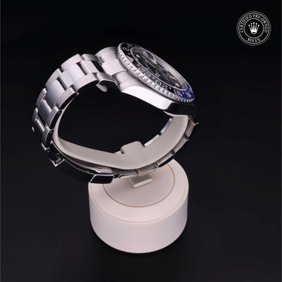 Rolex Certified Pre-owned GMT II M116710BLNR-0002 front on black background
