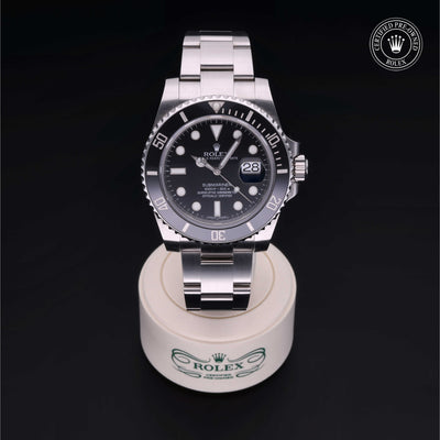 Rolex Certified Pre-owned Submariner Date M116610LN-0001 front on black background