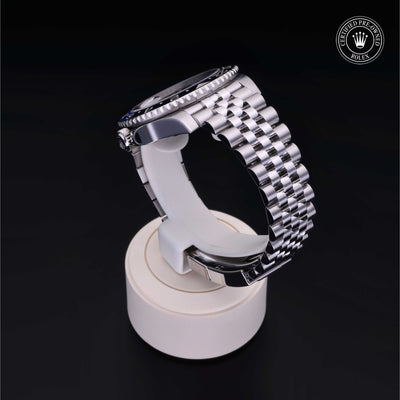 Rolex Certified Pre-owned GMT M126710BLNR-0002 front on black background