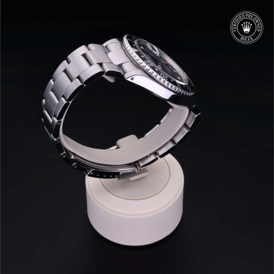 Rolex Certified Pre-owned GMT II M16710LN-0004 front on black background