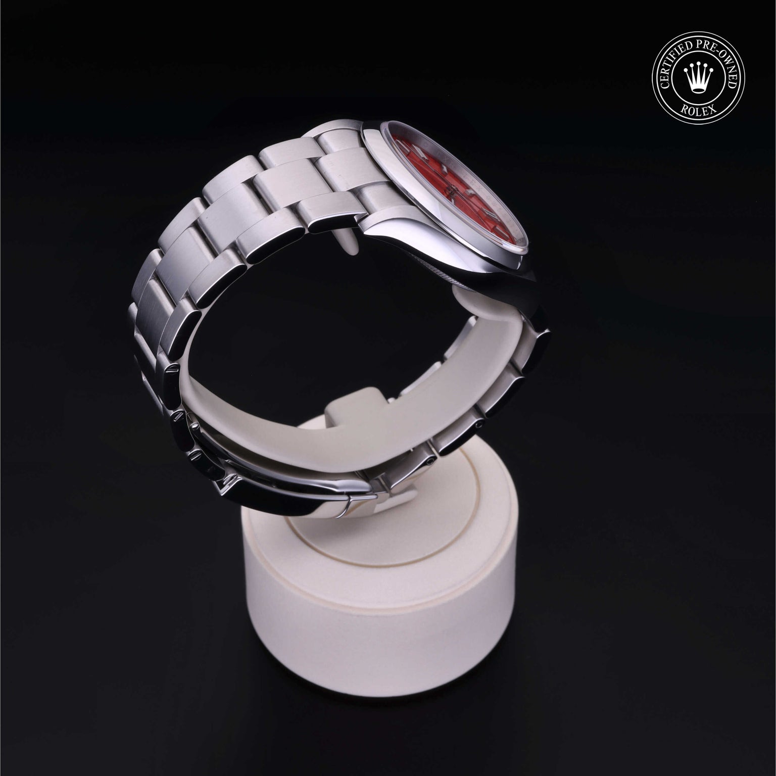 Rolex Certified Pre-owned Oyster Perpetual M126000-0007 front on black background