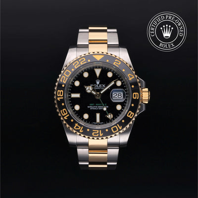 Rolex Certified Pre-owned GMT M116713LN-0001 front on black background