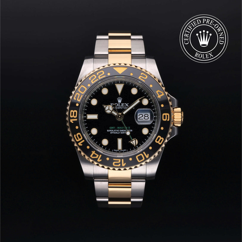 Rolex Certified Pre-owned GMT M116713LN-0001 front on black background