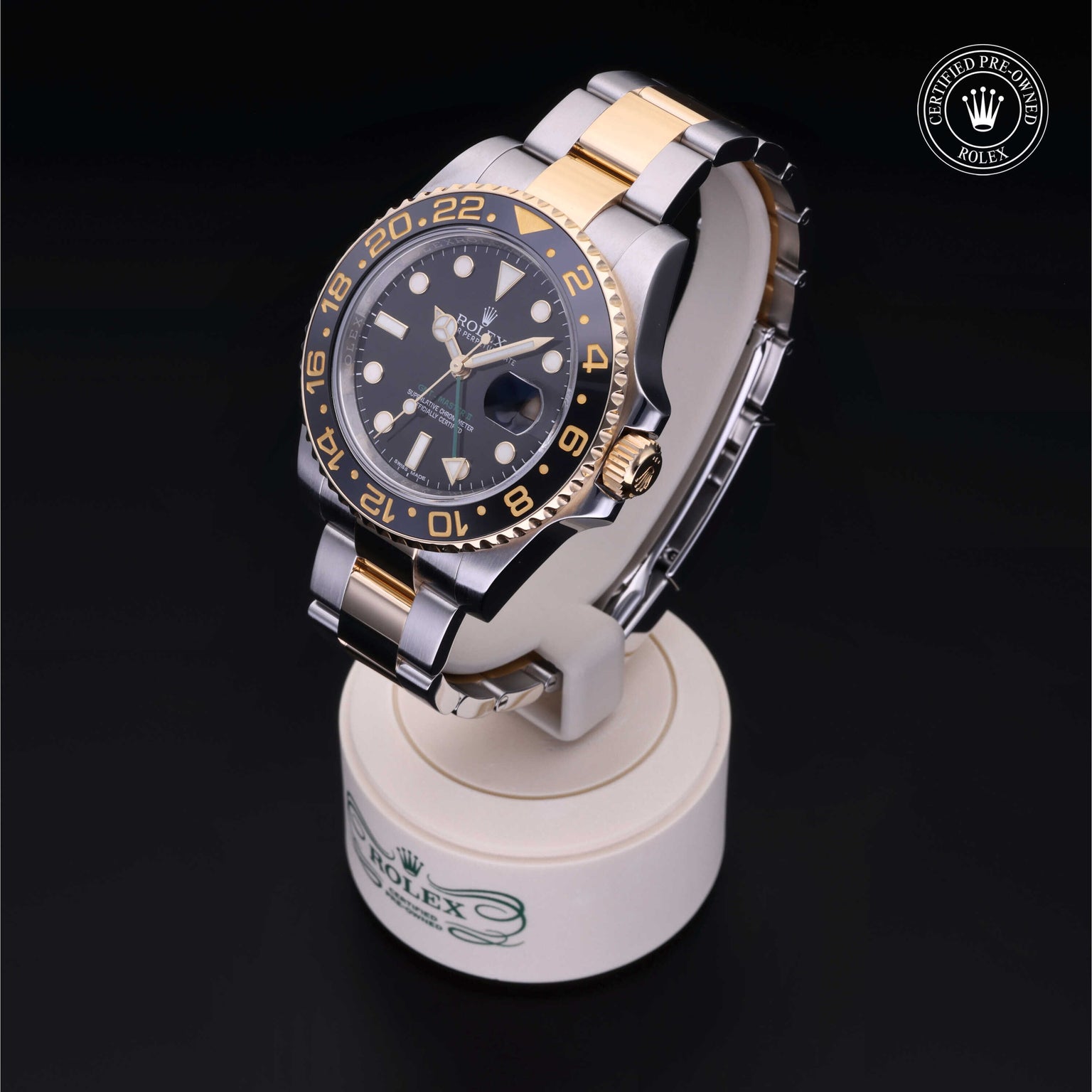 Rolex Certified Pre-owned GMT M116713LN-0001 front on black background
