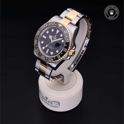 Rolex Certified Pre-owned GMT M116713LN-0001 front on black background