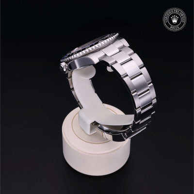 Rolex Certified Pre-owned GMT M126710BLNR-0003 front on black background