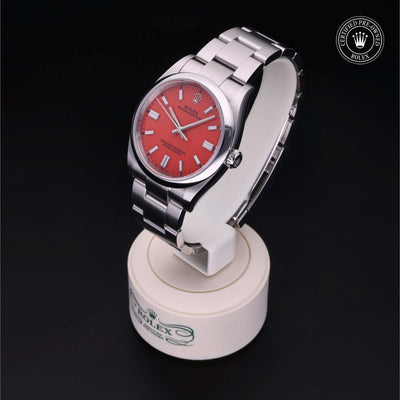 Rolex Certified Pre-owned Oyster Perpetual M126000-0007 front on black background
