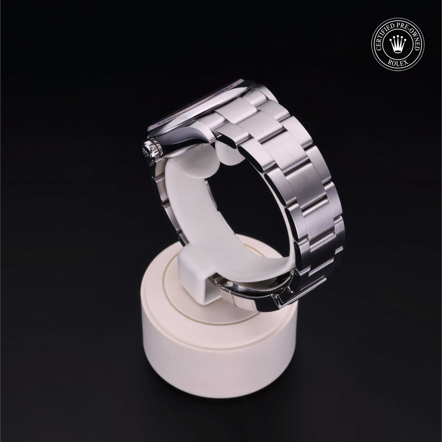 Rolex Certified Pre-owned Oyster Perpetual M126000-0007 front on black background