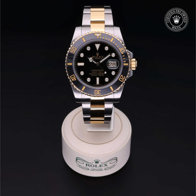 Rolex Certified Pre-owned Submariner Date M116613LN-0003 front on black background