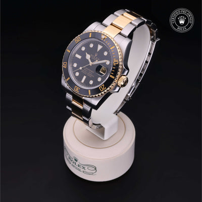 Rolex Certified Pre-owned Submariner Date M116613LN-0003 front on black background
