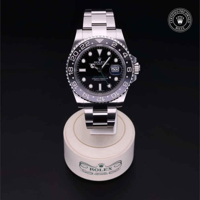 Rolex Certified Pre-owned GMT M116710LN-0001 front on black background