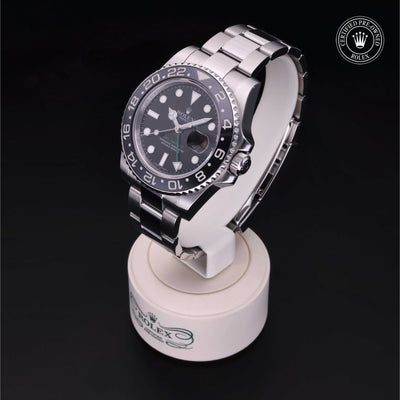 Rolex Certified Pre-owned GMT M116710LN-0001 front on black background