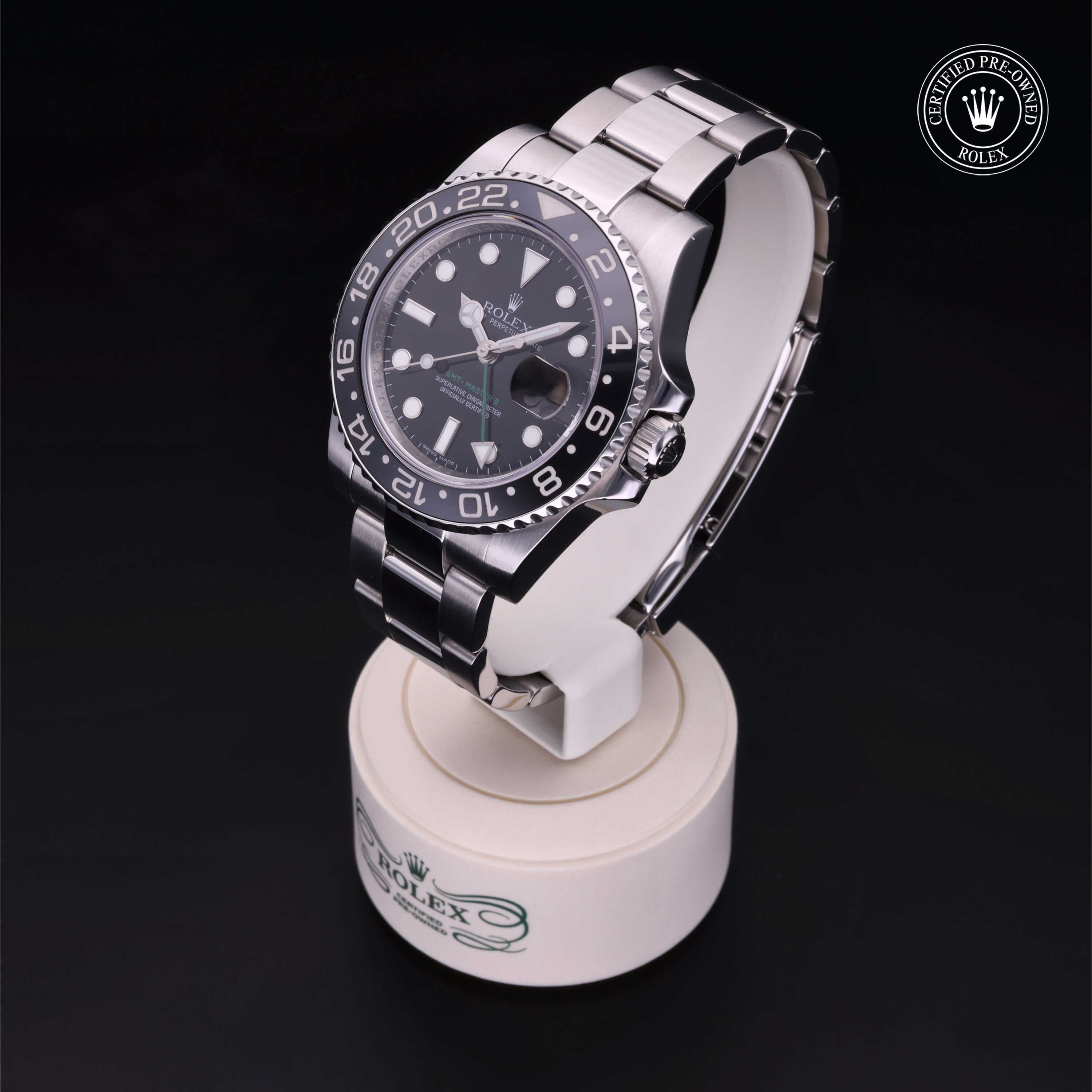 Rolex Certified Pre-owned GMT M116710LN-0001 front on black background