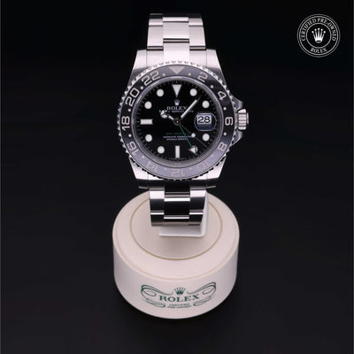 Rolex Certified Pre-owned GMT II M116710LN-0001 front on black background