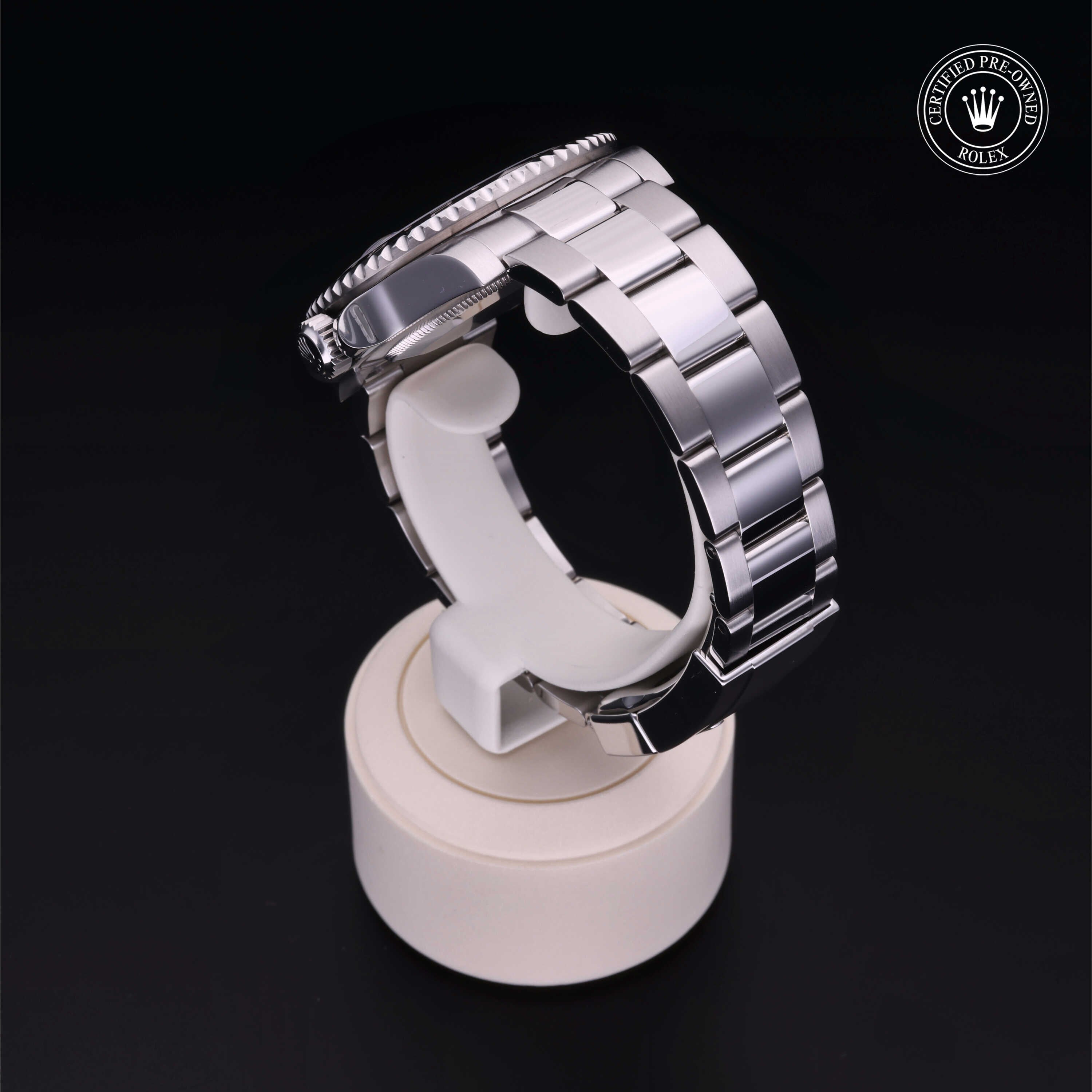 Rolex Certified Pre-owned GMT II M116710LN-0001 front on black background