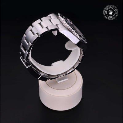 Rolex Certified Pre-owned GMT II M116710LN-0001 front on black background