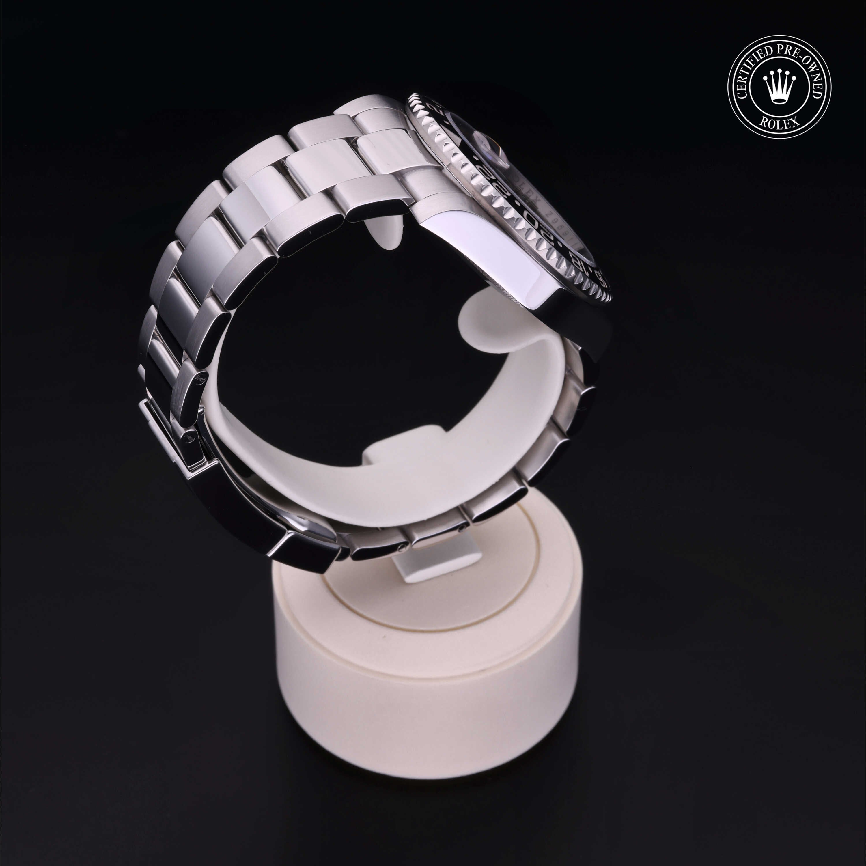 Rolex Certified Pre-owned GMT II M116710LN-0001 front on black background