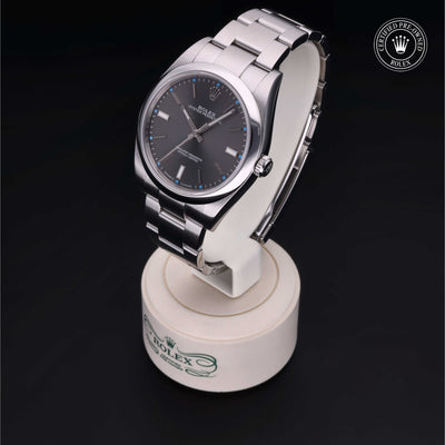 Rolex Certified Pre-owned Oyster Perpetual M114300-0001 front on black background