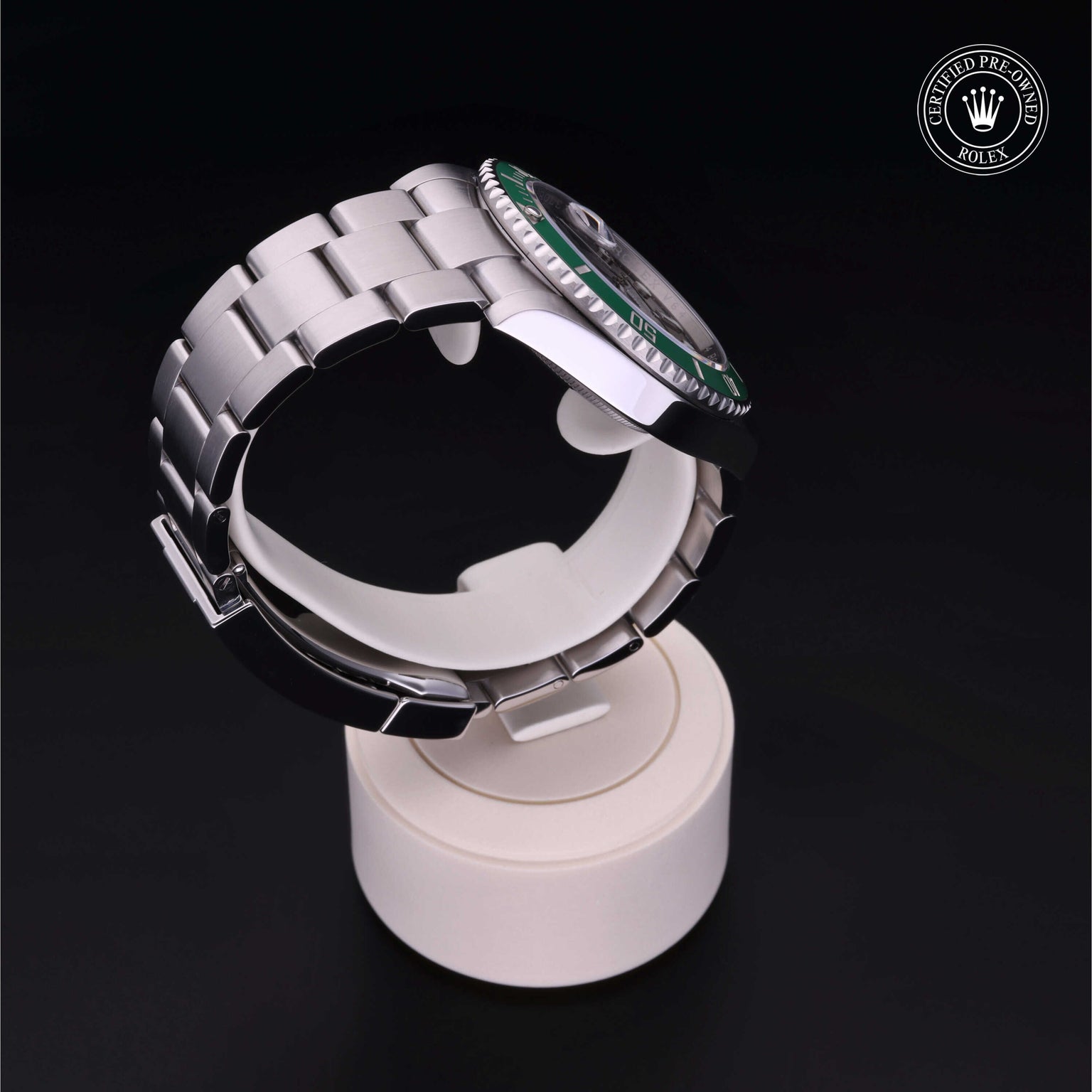 Rolex Certified Pre-owned Submariner M126610LV-0002 front on black background