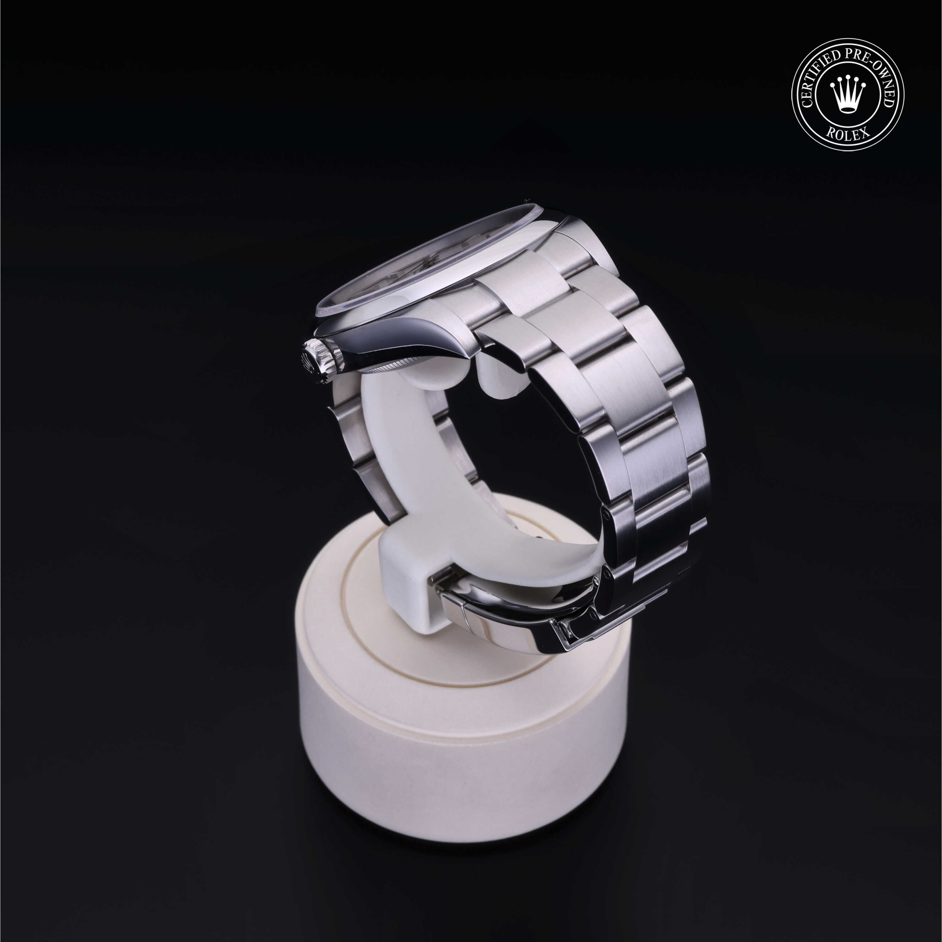 Rolex Certified Pre-owned Oyster Perpetual M114300-0004 front on black background