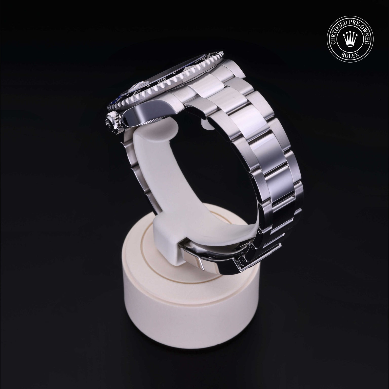 Rolex Certified Pre-owned GMT M126710BLNR-0003 front on black background