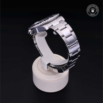 Rolex Certified Pre-owned GMT M126710BLNR-0003 front on black background