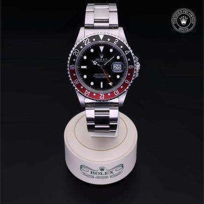Rolex Certified Pre-owned GMT II M16710-0009 front on black background