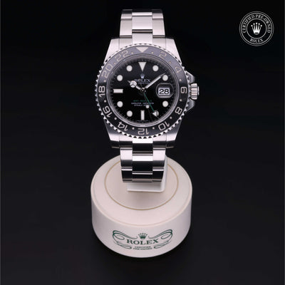 Rolex Certified Pre-owned GMT M116710LN-0001 front on black background