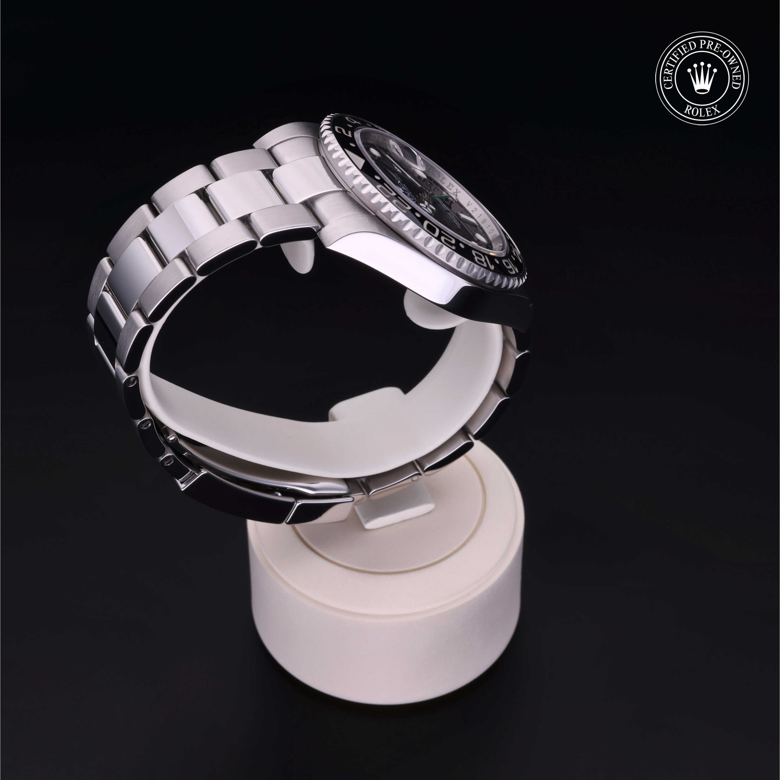 Rolex Certified Pre-owned GMT M116710LN-0001 front on black background