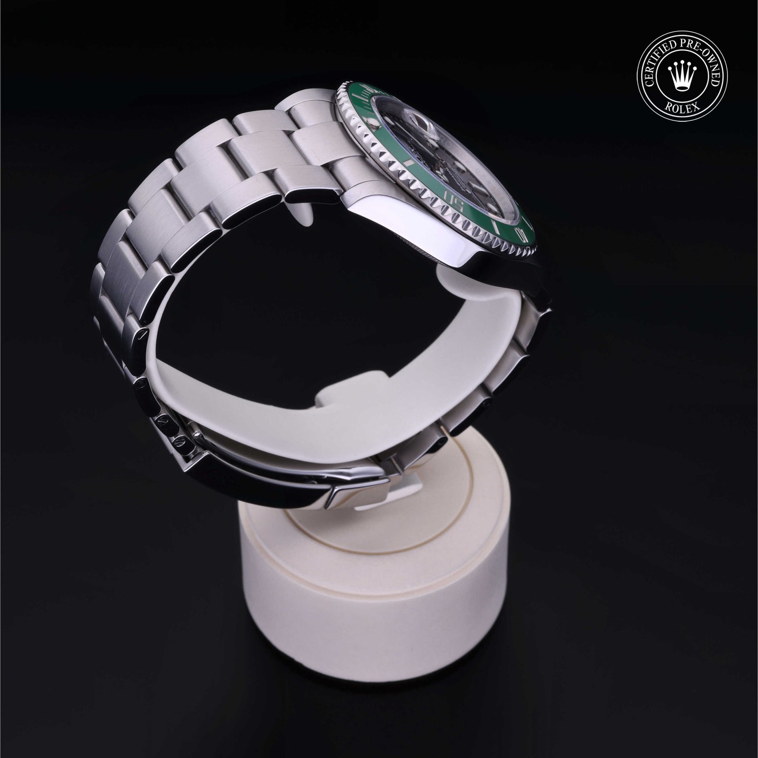 Rolex Certified Pre-owned Submariner M126610LV-0002 front on black background