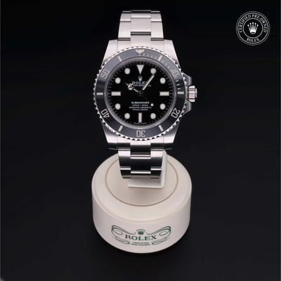 Rolex Certified Pre-owned Submariner Non Date M114060-0002 front on black background