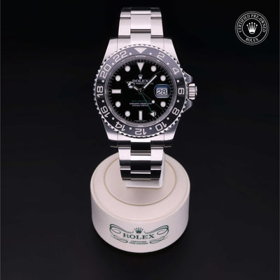 Rolex Certified Pre-owned GMT M116710LN-0001 front on black background