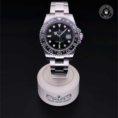 Rolex Certified Pre-owned GMT II M116710LN-0001 front on black background