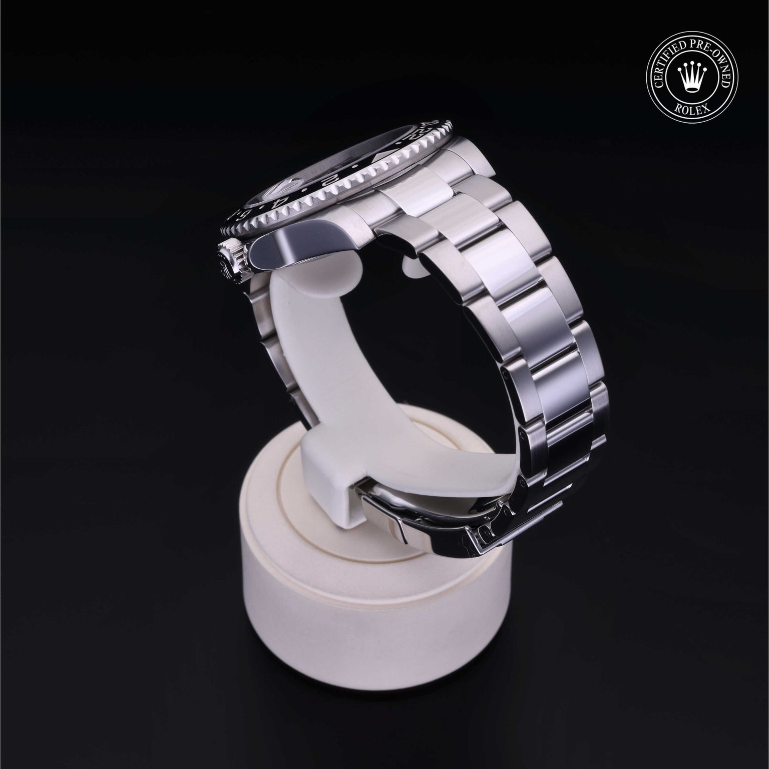 Rolex Certified Pre-owned GMT II M116710LN-0001 front on black background