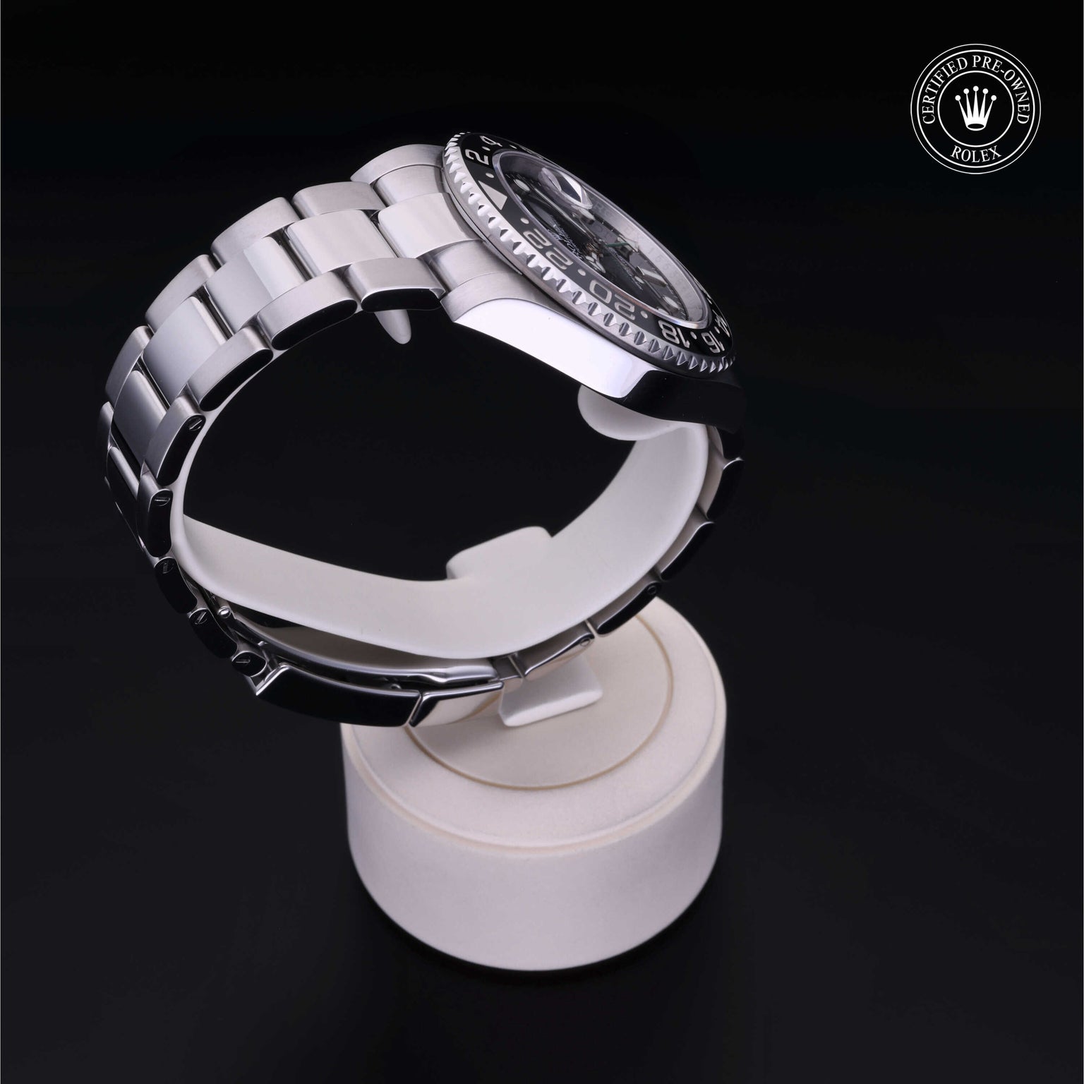 Rolex Certified Pre-owned GMT II M116710LN-0001 front on black background