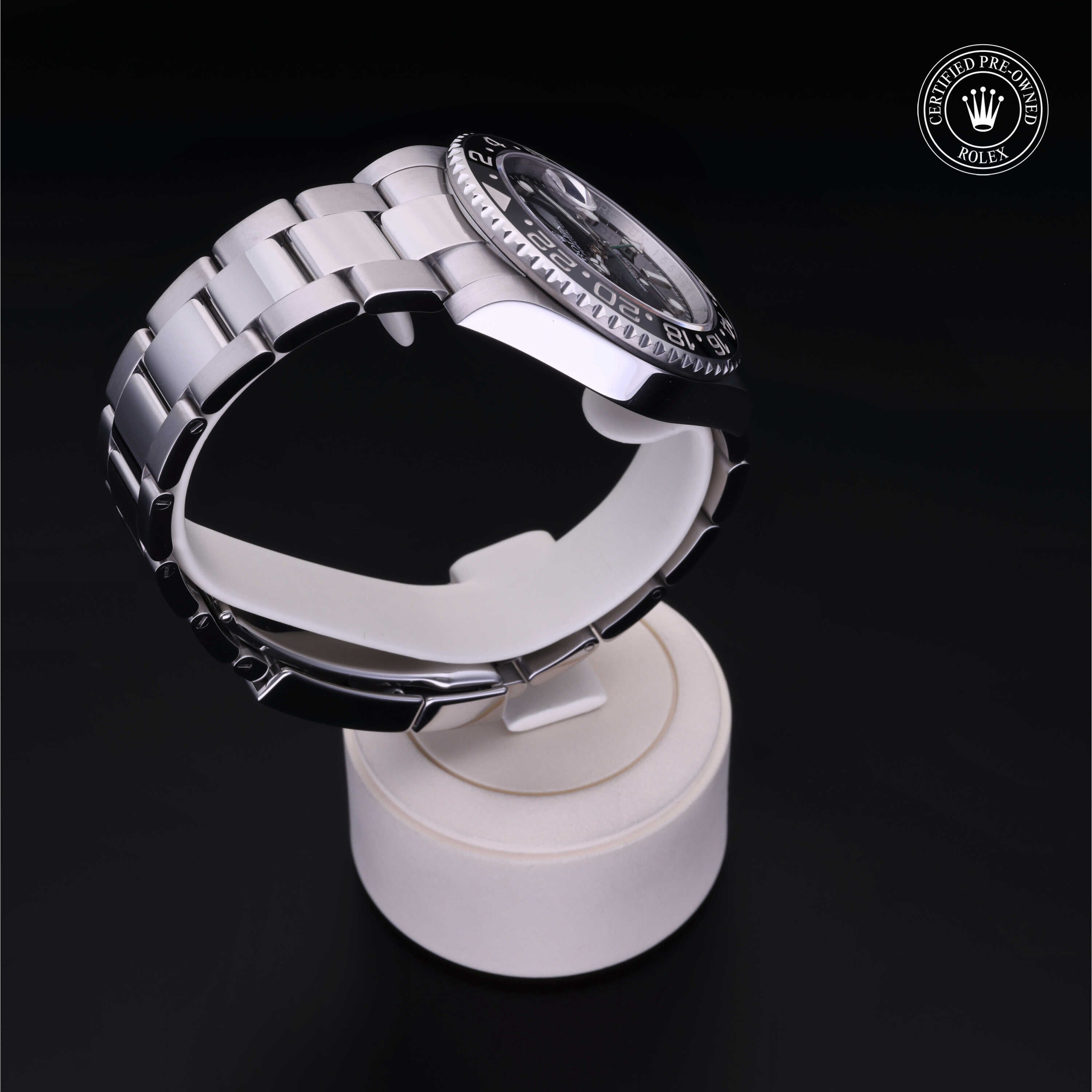 Rolex Certified Pre-owned GMT II M116710LN-0001 front on black background