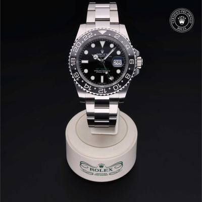 Rolex Certified Pre-owned GMT M116710LN-0001 front on black background