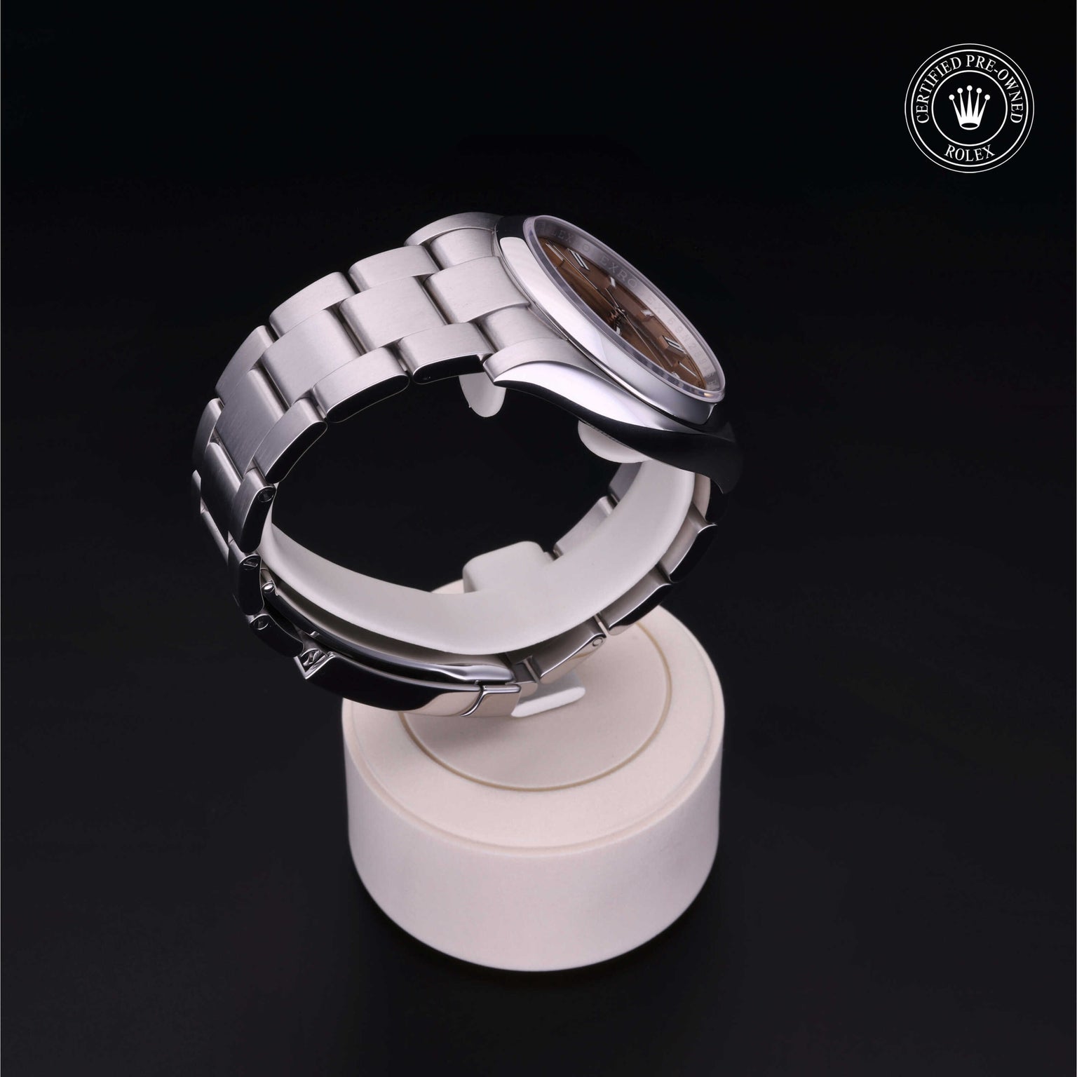 Rolex Certified Pre-owned Oyster Perpetual M116000-0011 front on black background