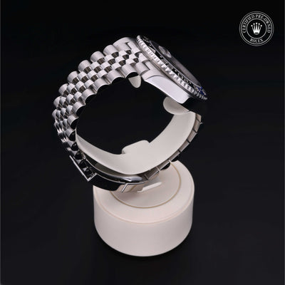 Rolex Certified Pre-owned GMT II M126710BLNR-0002 front on black background