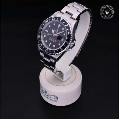 Rolex Certified Pre-owned GMT M16710LN-0004 front on black background
