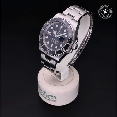 Rolex Certified Pre-owned Submariner M126610LN-0001 front on black background