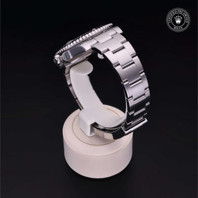 Rolex Certified Pre-owned Submariner Date M116610LN-0001 front on black background