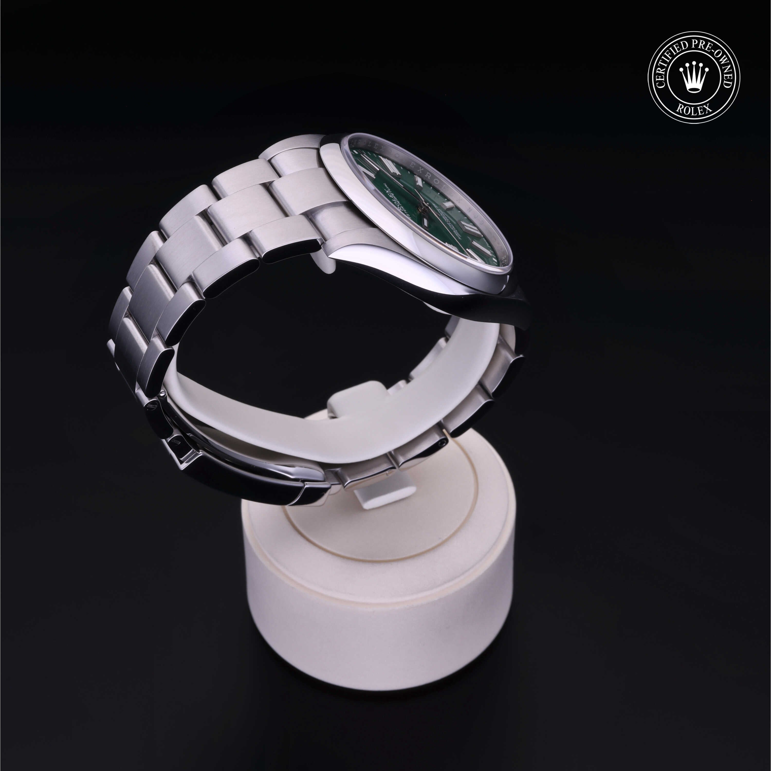 Rolex Certified Pre-owned Oyster Perpetual M124300-0005 front on black background