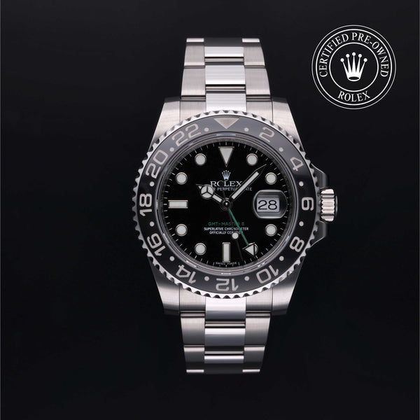 Rolex Certified Pre-owned GMT II M116710LN-0001 front on black background
