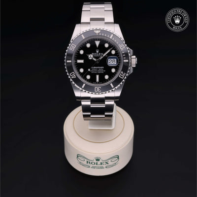 Rolex Certified Pre-owned Submariner M126610LN-0001 front on black background