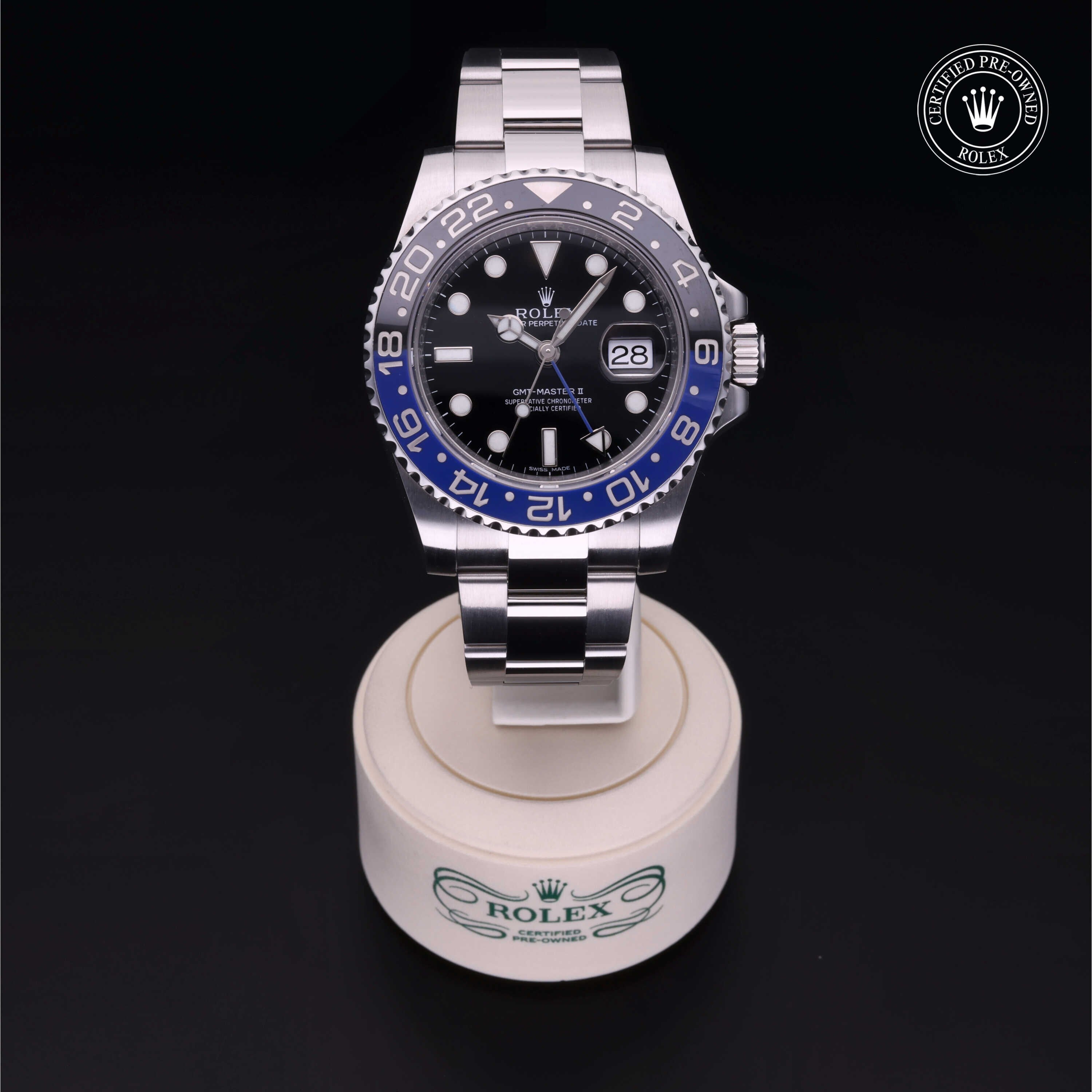 Rolex Certified Pre-owned GMT M116710BLNR-0002 front on black background