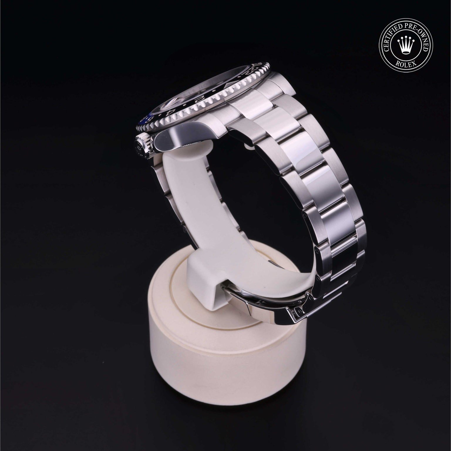 Rolex Certified Pre-owned GMT M116710BLNR-0002 front on black background