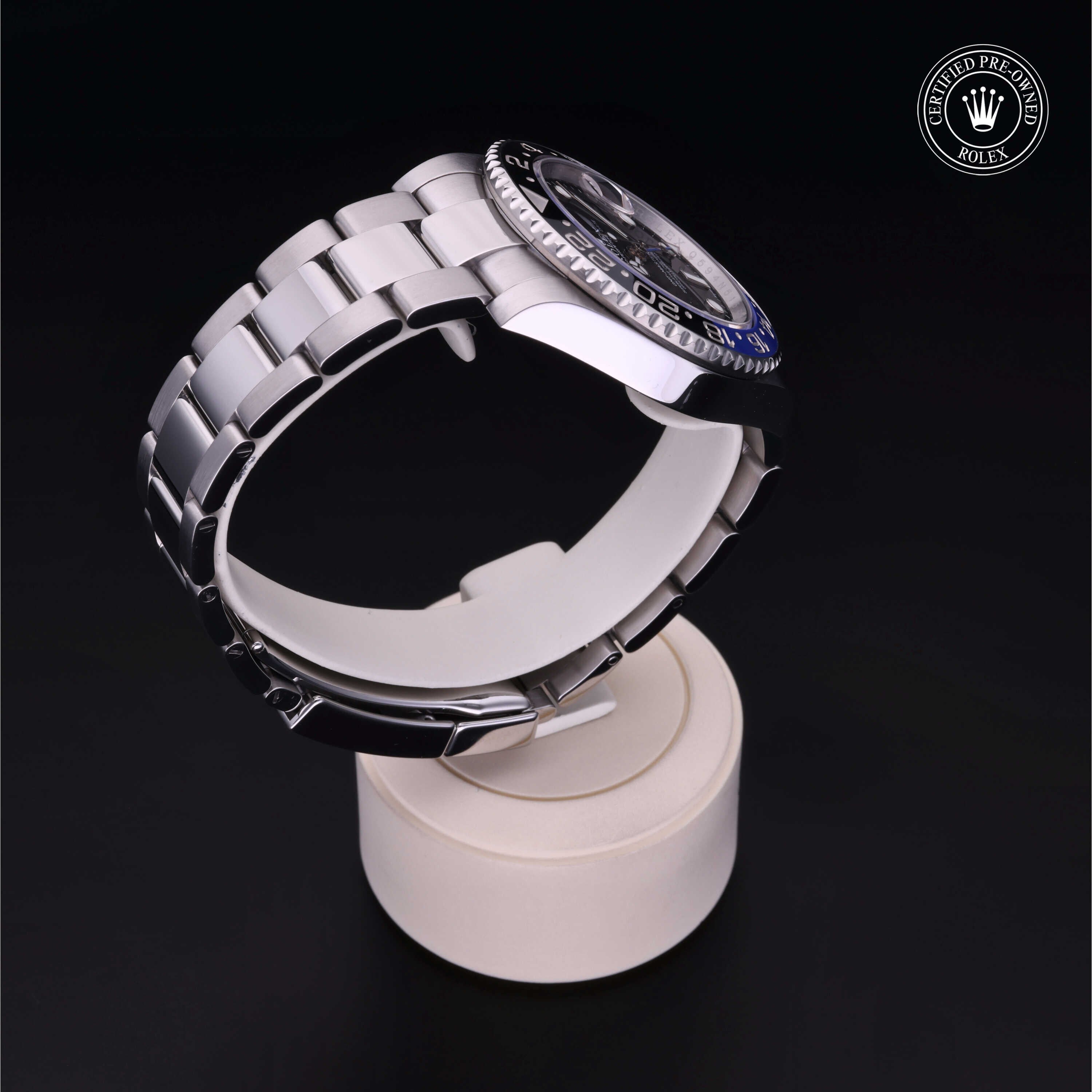 Rolex Certified Pre-owned GMT M116710BLNR-0002 front on black background