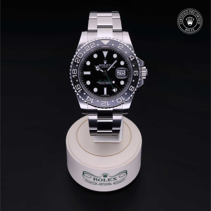 Rolex Certified Pre-owned GMT M116710LN-0001 front on black background